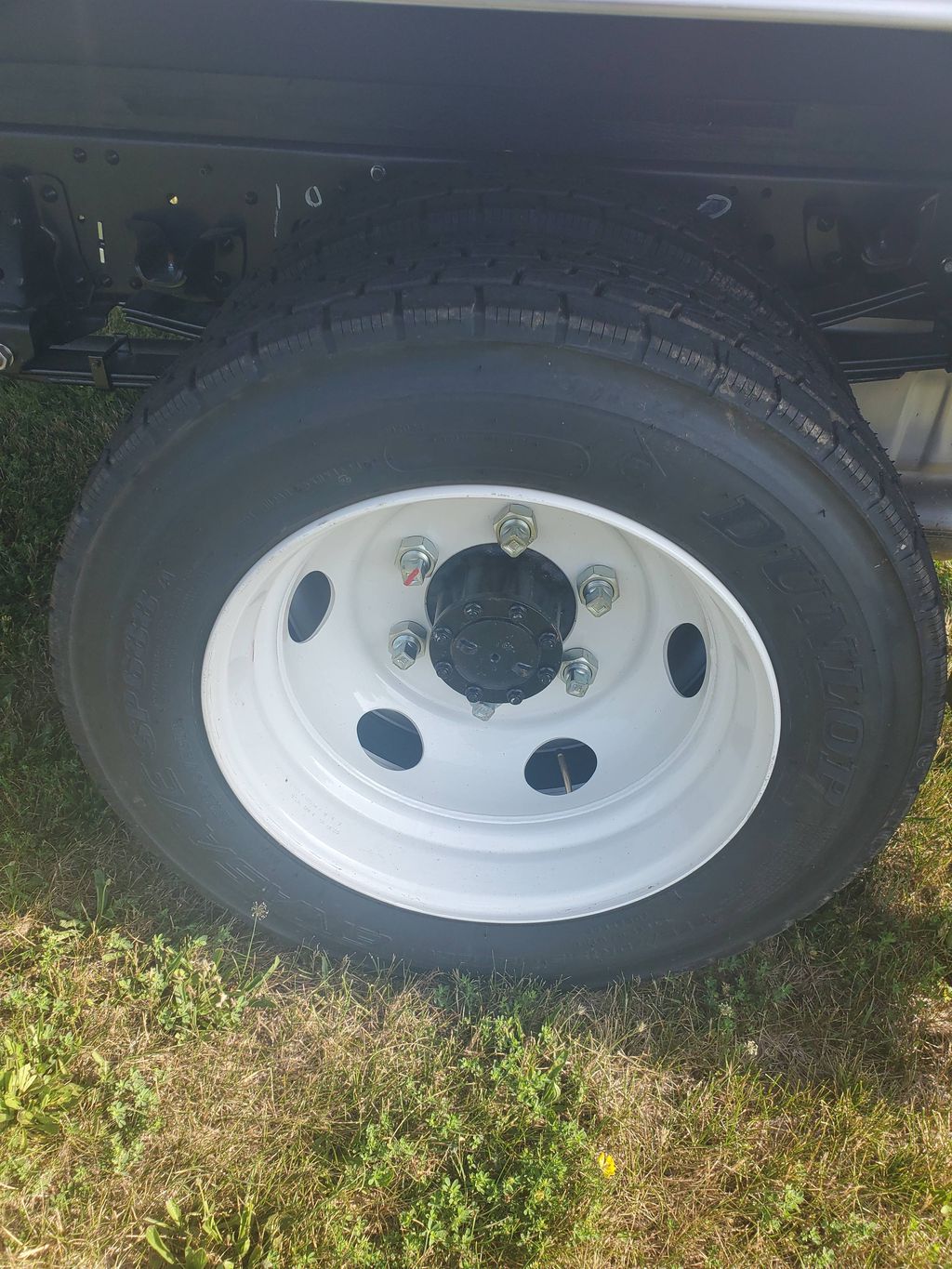 Slide images of 2026 ISUZU NPR GAS HD