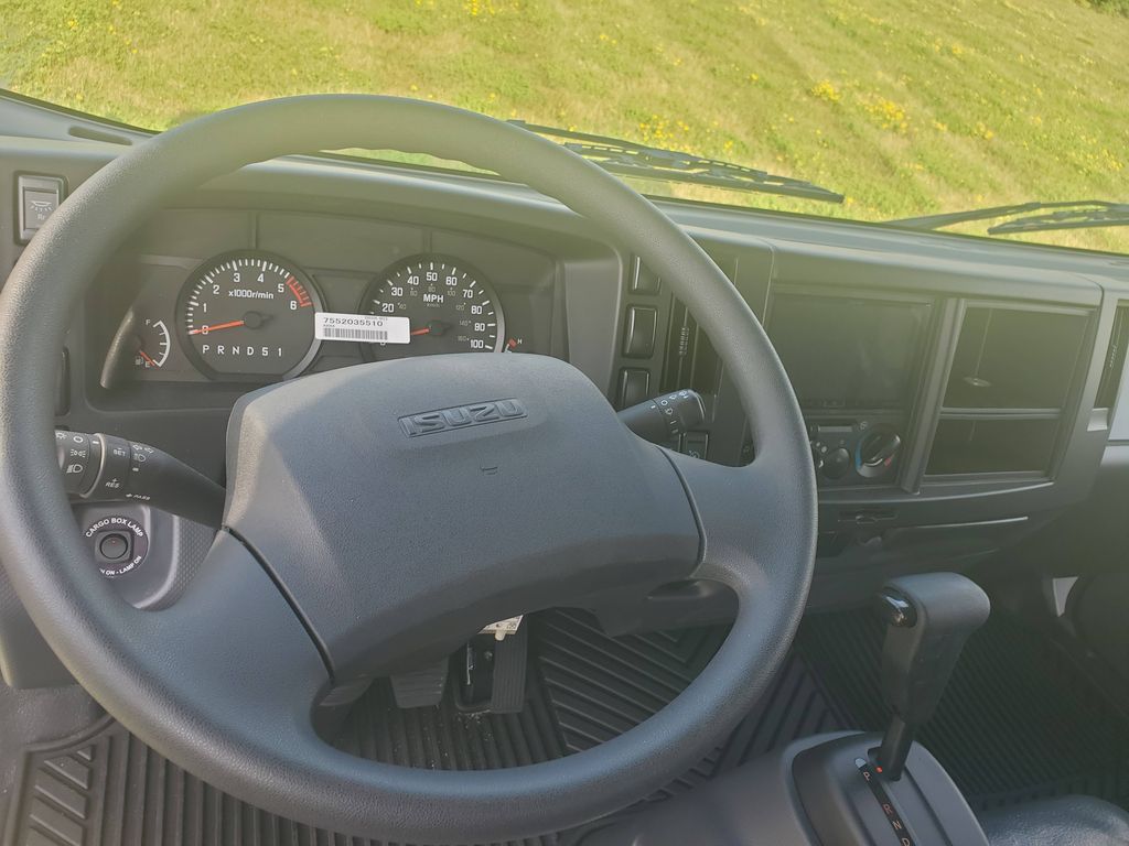 Slide images of 2026 ISUZU NPR GAS HD