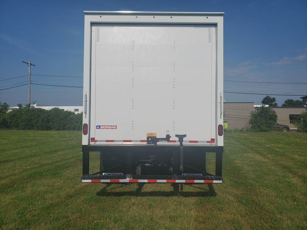 Slide images of 2026 ISUZU NPR GAS HD