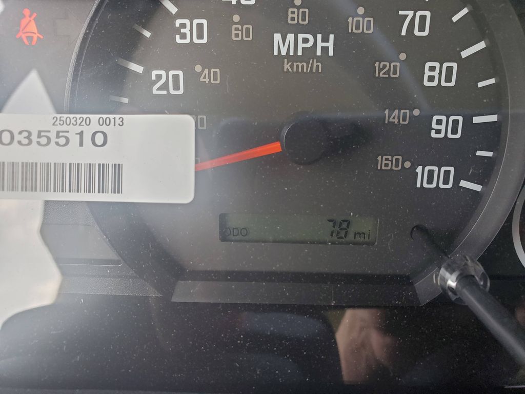 Slide images of 2026 ISUZU NPR GAS HD