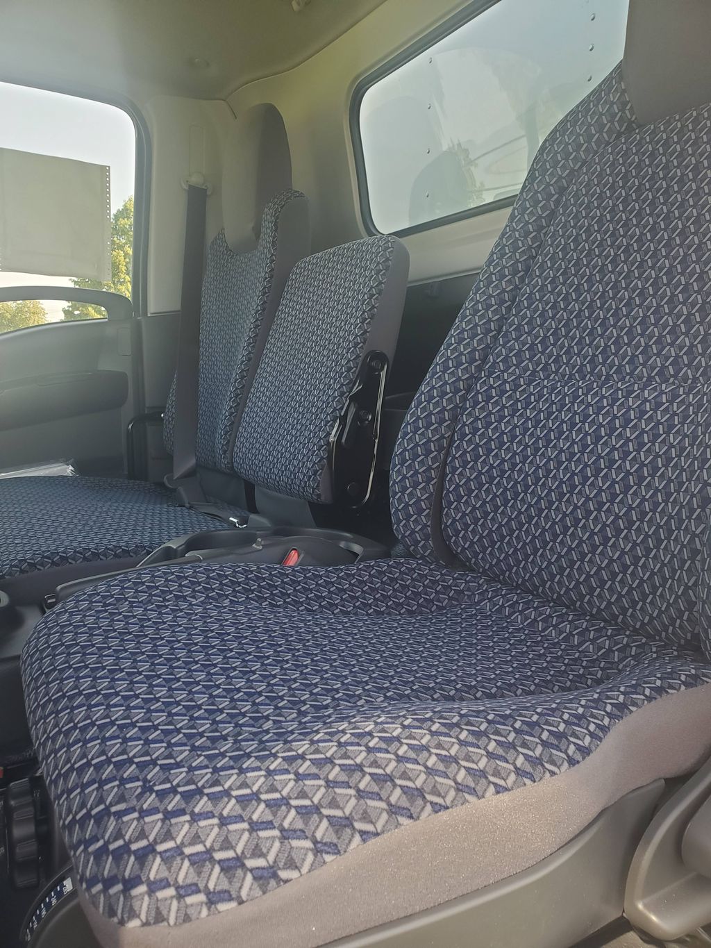 Slide images of 2026 ISUZU NPR GAS HD