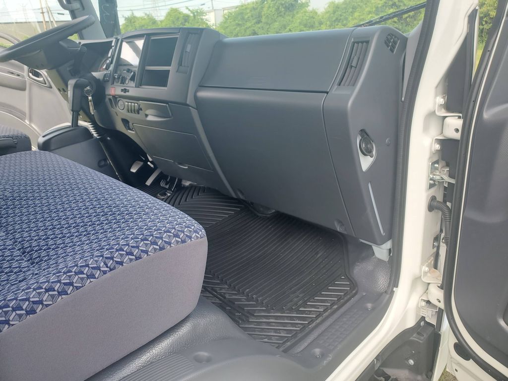 Slide images of 2026 ISUZU NPR GAS HD