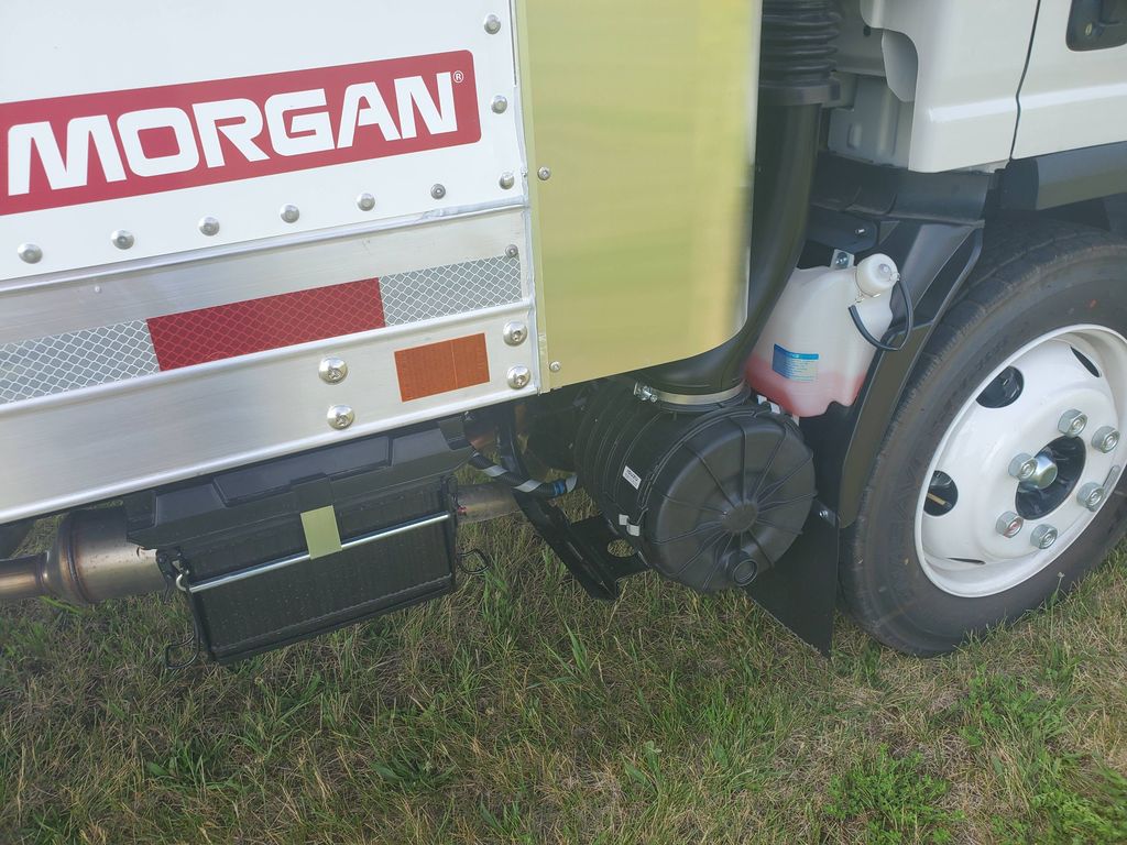 Slide images of 2026 ISUZU NPR GAS HD
