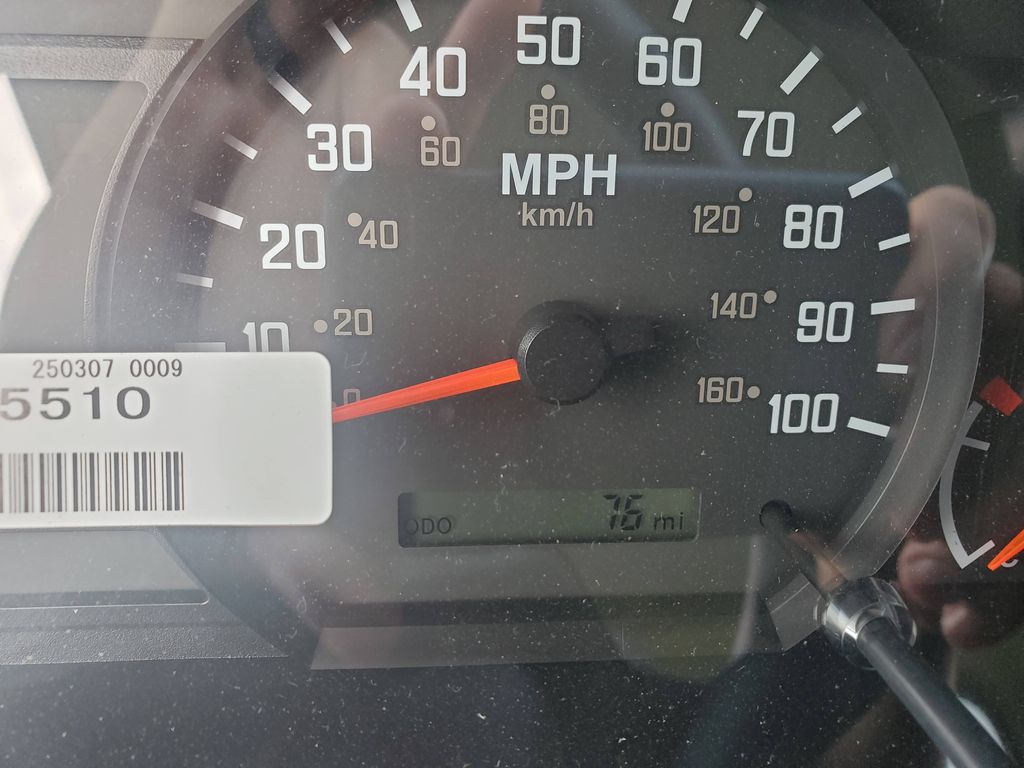Slide images of 2026 ISUZU NPR GAS HD