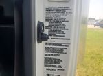 Slide images of 2026 ISUZU NPR GAS HD
