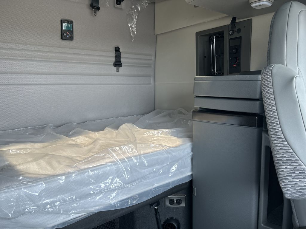 Slide images of 2026 VOLVO VNR64T660 