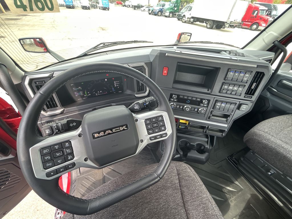 Slide images of 2026 MACK PR64T DAY CAB DEMO
