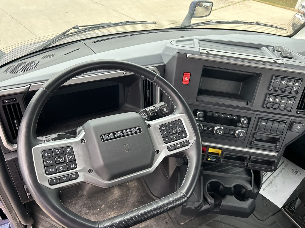 Slide images of 2026 MACK PR64T DAY CAB DEMO