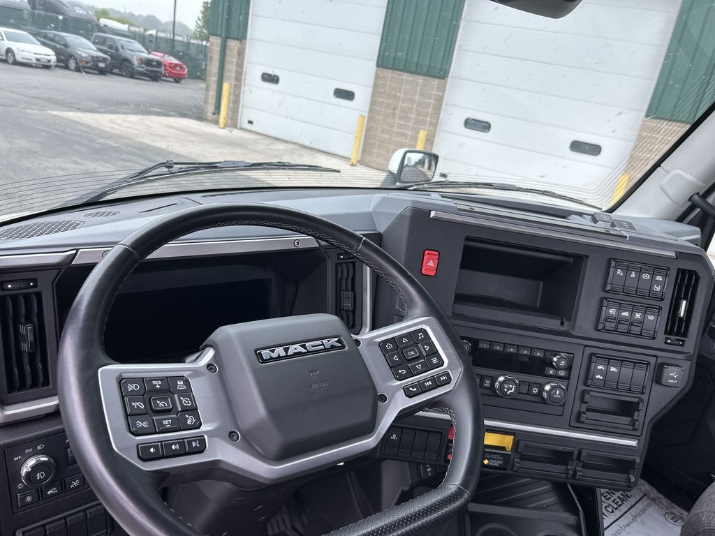 Slide images of 2025 MACK PR64T DAY CAB DEMO