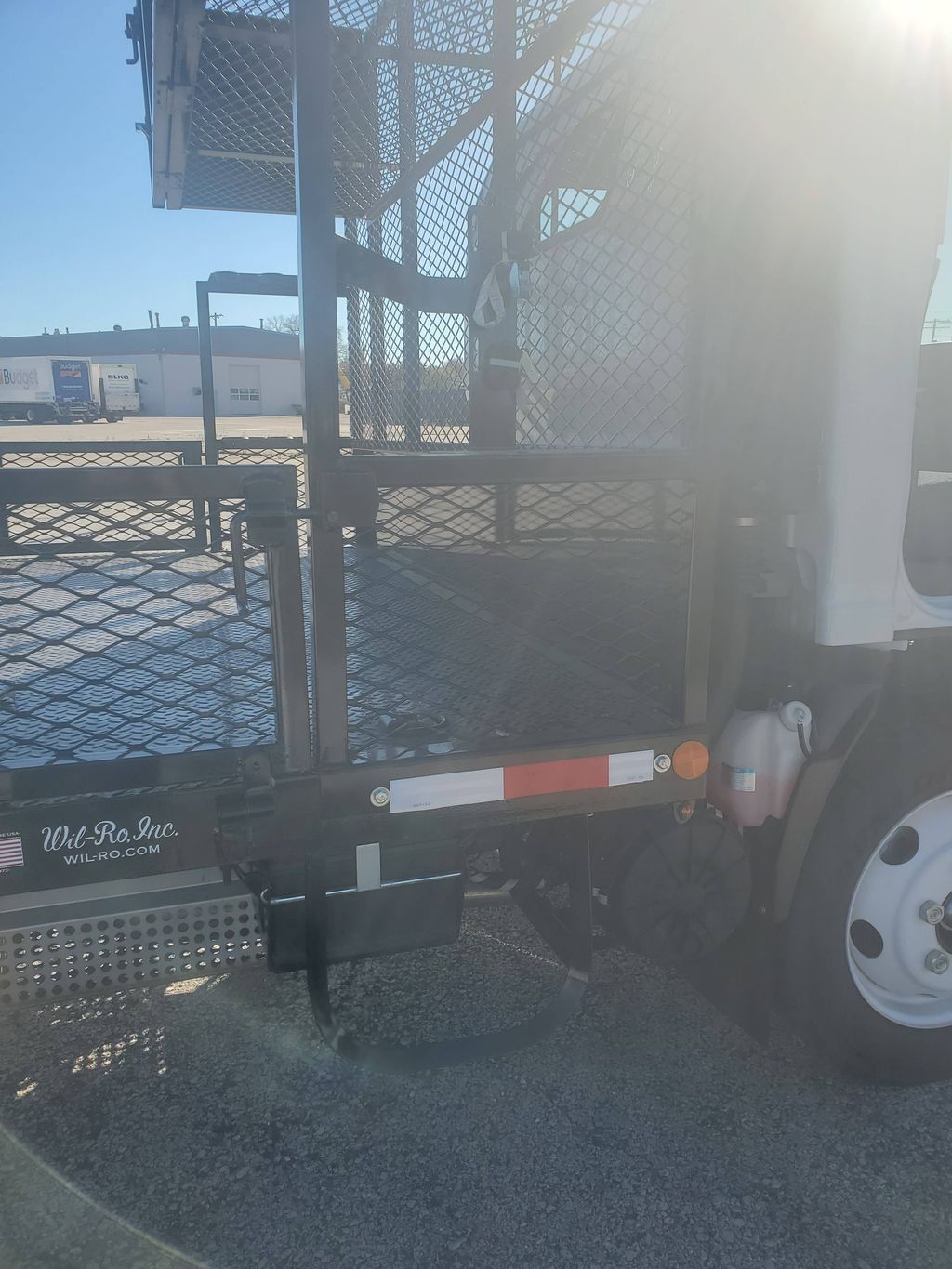 Slide images of 2026 ISUZU NPR GAS HD 