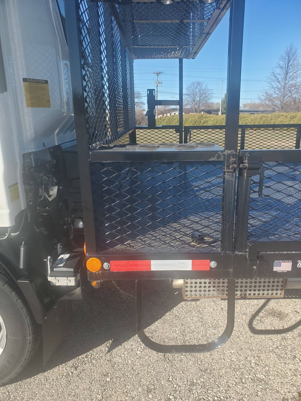 Slide images of 2026 ISUZU NPR GAS HD 