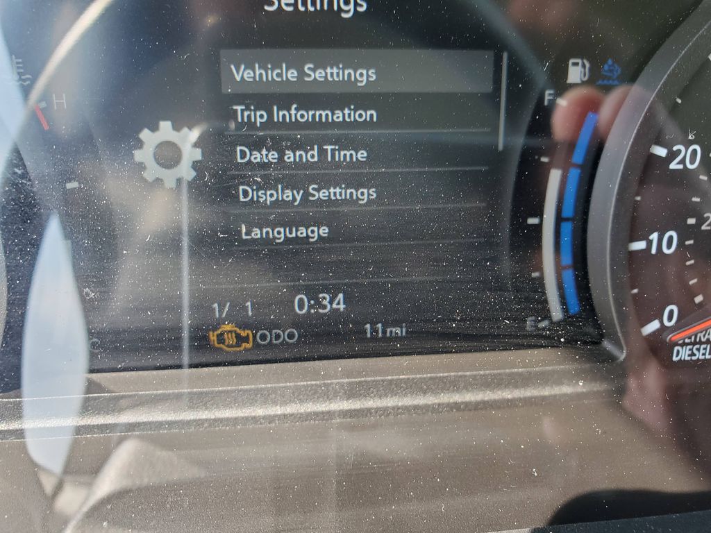 Slide images of 2026 ISUZU NPR XD
