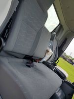 Slide images of 2026 ISUZU NPR XD