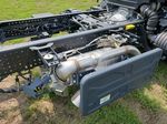 Slide images of 2026 ISUZU NPR XD
