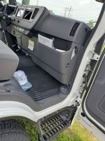 Slide images of 2026 ISUZU NPR XD