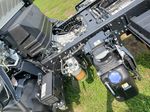 Slide images of 2026 ISUZU NPR XD
