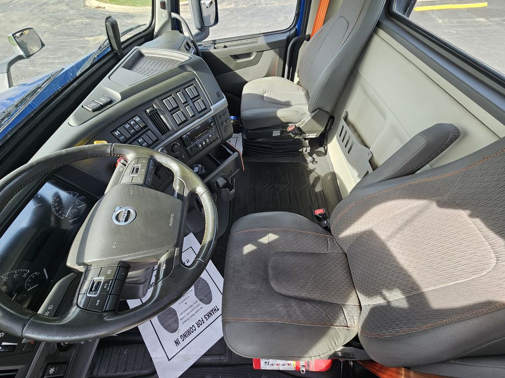 Slide images of 2024 VOLVO VNR64T300