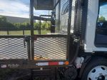 Slide images of 2026 ISUZU NPR GAS HD
